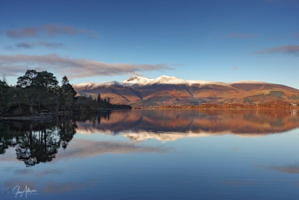 This stunning photo was taken in the early evening of the previous one, and really sums up the delights of winter in the Lake District. Snow capped Skiddaw looks magnificent across the water. Canon EOS 1d Mk11; Canon EF 28-300 L IS USM Lens.